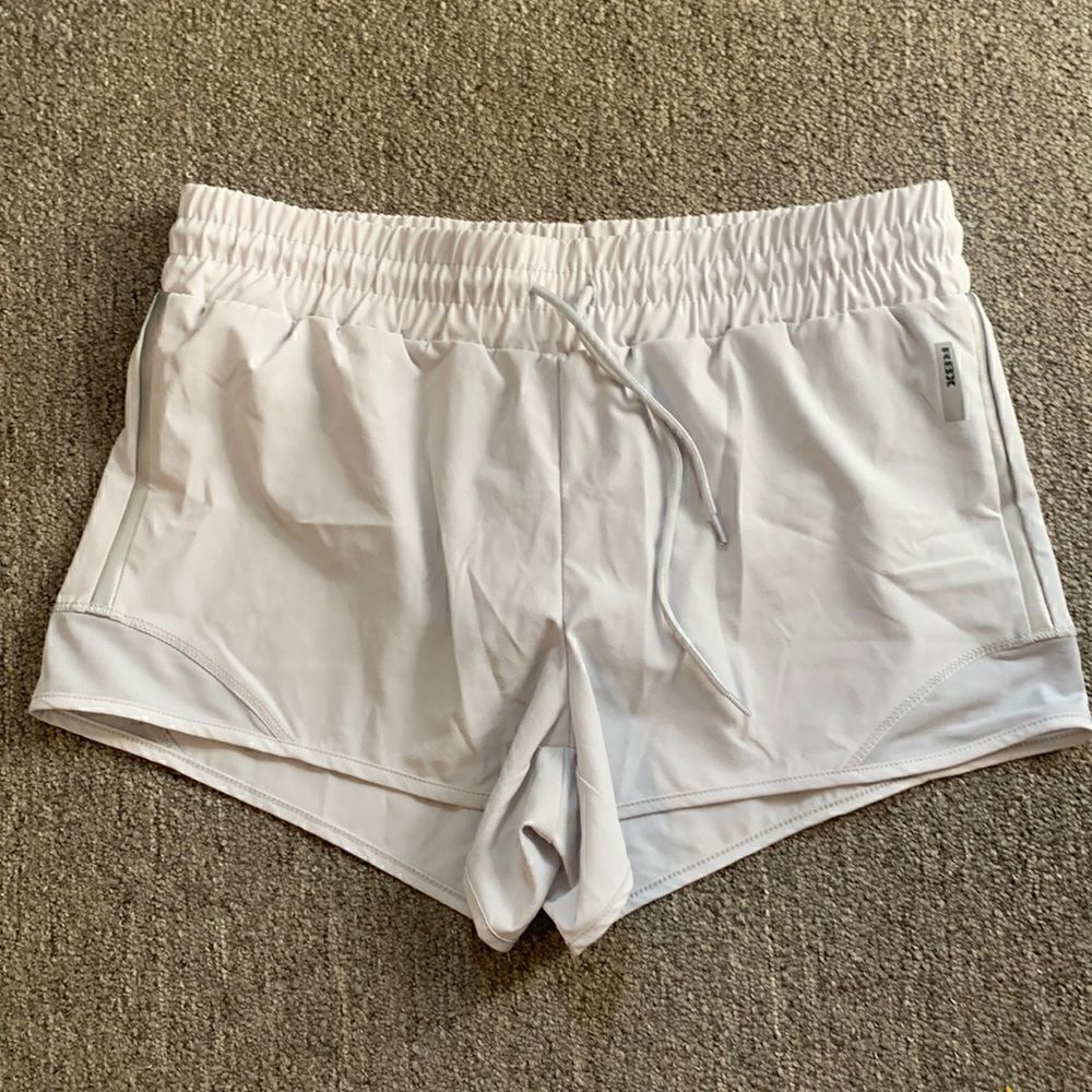 EUC Reebok light gray running shorts! Size S